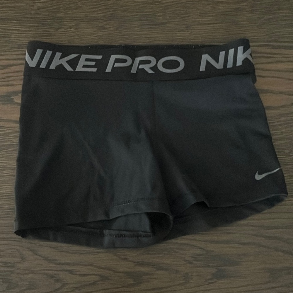 Black and white dry fit Nike pros size small